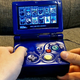 Illustration for article titled Theres an Entire Nintendo Wii Packed Inside This Custom Jumbo Game Boy Advance